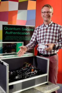 about_pinkse_demonstrator Pepijn Pinkse with the quantum secure authentication demonstrator and a quantum credit card.
